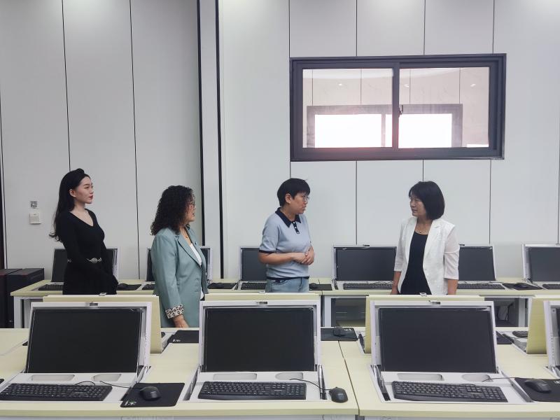 退役军人事务局三位老师参观考察学校.jpg